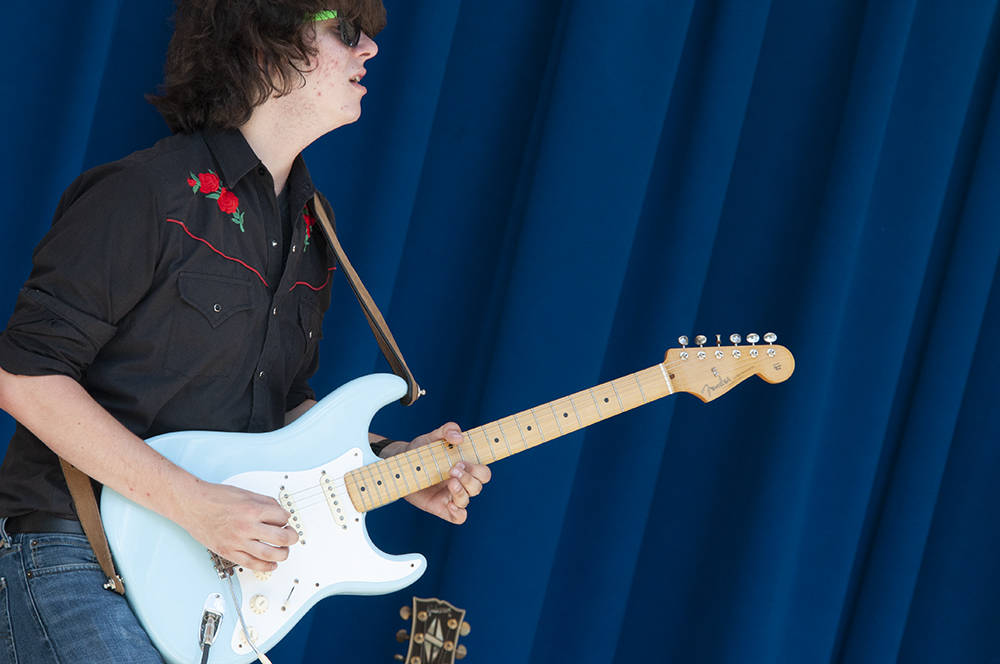 Ian Churchill Lloyd guitarist for Washington band FuseBox playing guitar