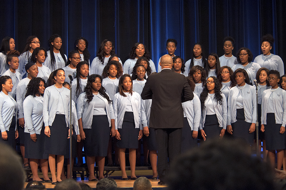 Spelman College choir sing for a group of people