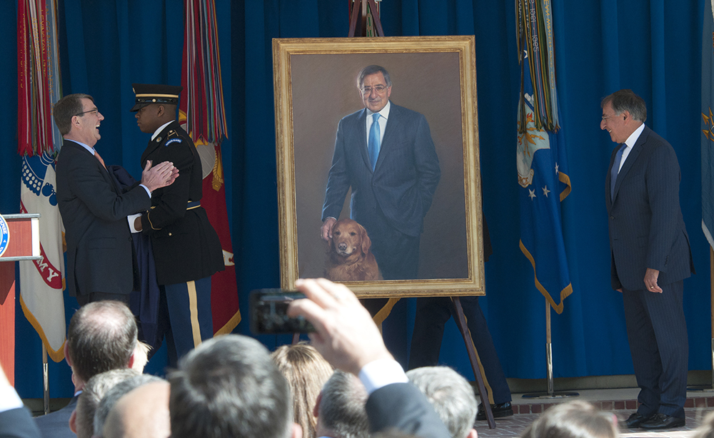 Defense Secretary Ash Carter helps unveil the official portrait of Leon Panetta