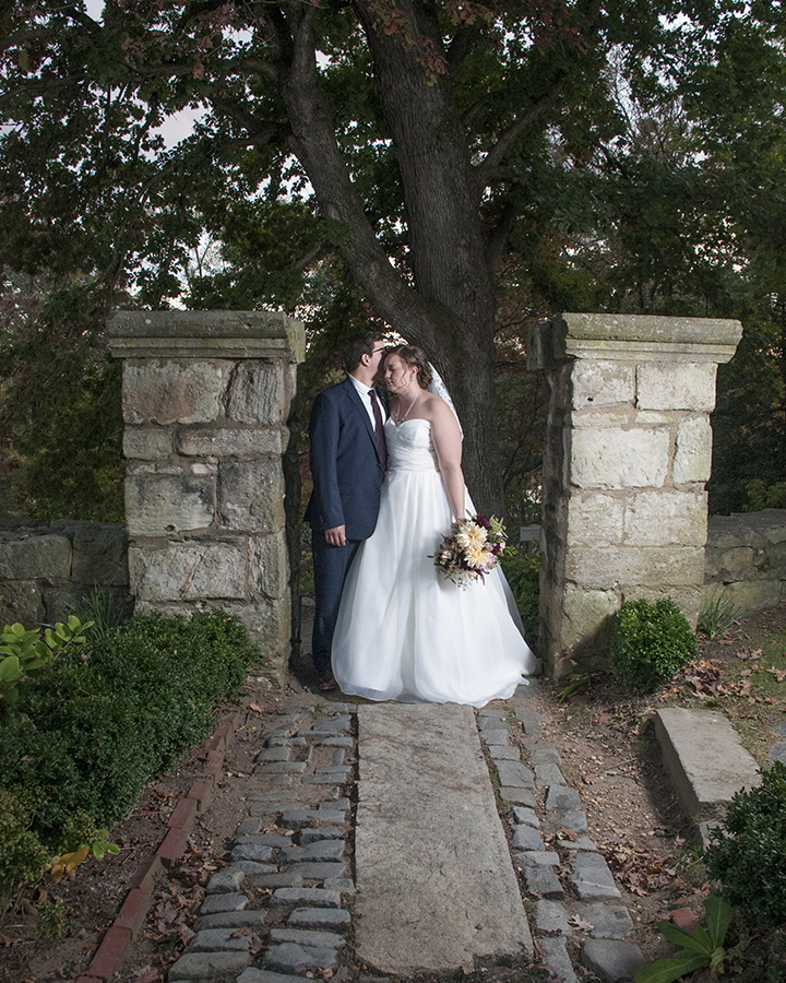 Newly wedded couple posing for a picture