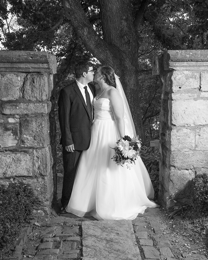 Newly wedded couple posing for a picture