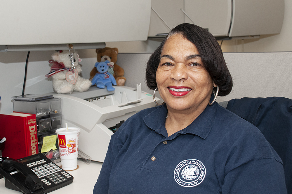 Longtime WHS employee posing for a picture