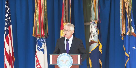 Chuck Hagel speaking on a podium at the Pentagon